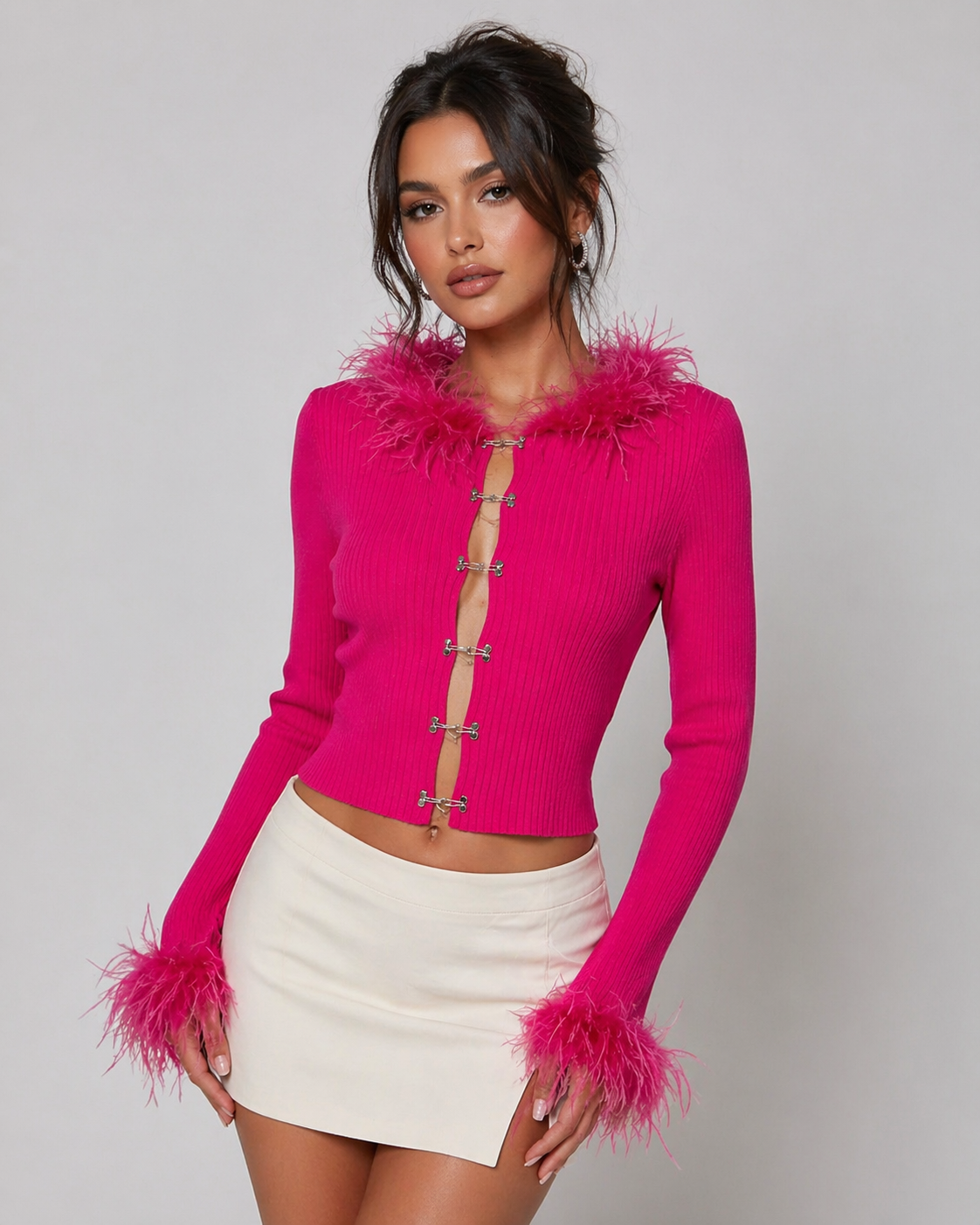 Blusa con plumas Abierta Fucsia LC